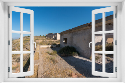 Fototapeta Naklejka Na Ścianę Okno 3D - old house of a mining complex in southern Spain