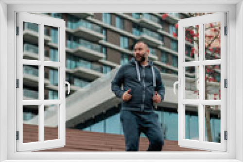 Young man jogging on stairs