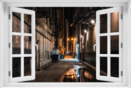 Fototapeta Naklejka Na Ścianę Okno 3D - Dark abandoned alley at night downtown Chicago