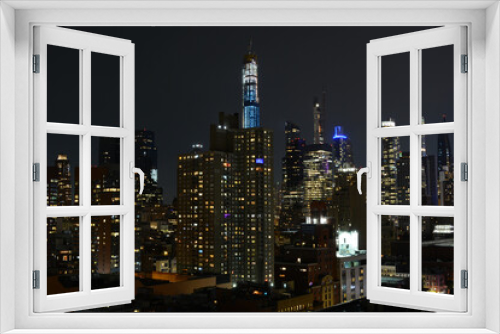 Fototapeta Naklejka Na Ścianę Okno 3D - New York, NY, USA - June 29, 2019: Night Manhattan view from The Press Lounge