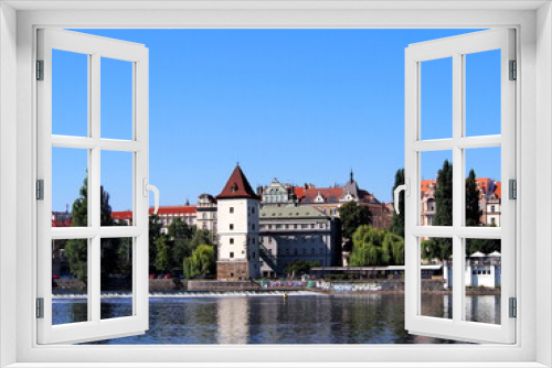 Fototapeta Naklejka Na Ścianę Okno 3D - view of Prague from the deck of a steamer, historical city center, panorama on the Vltava, sunny summer day, tourism