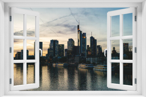 Fototapeta Naklejka Na Ścianę Okno 3D - Behold the stunning Frankfurt skyline with towering high-rise buildings that define the city's financial and business district.