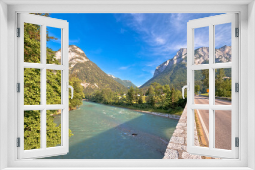 Fototapeta Naklejka Na Ścianę Okno 3D - Alpine road and Saalach river in Bavarian Alps view