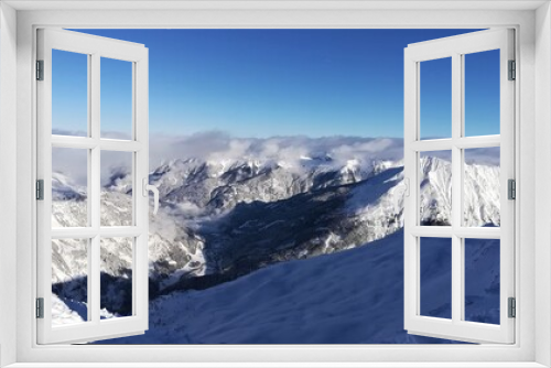 Fototapeta Naklejka Na Ścianę Okno 3D - View of the snowy Alps. Snowy mountain peaks. Amazing panorama of rocky mountains in winter.