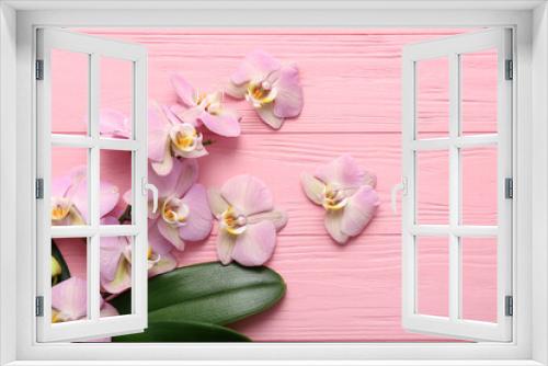 Fototapeta Naklejka Na Ścianę Okno 3D - Beautiful orchid flowers and leaves on color background