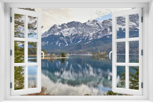 Fototapeta Naklejka Na Ścianę Okno 3D - Picturesque mountain lake in the german alps with snowy mountains in the background.