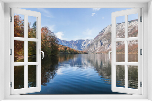 Fototapeta Naklejka Na Ścianę Okno 3D - Picturesque lake Bohinj which reflects the Alps. Triglav National Park in Slovenia in autumn