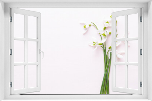Fototapeta Naklejka Na Ścianę Okno 3D - Fresh snowdrops on pink background with place for text. Spring greeting card.
