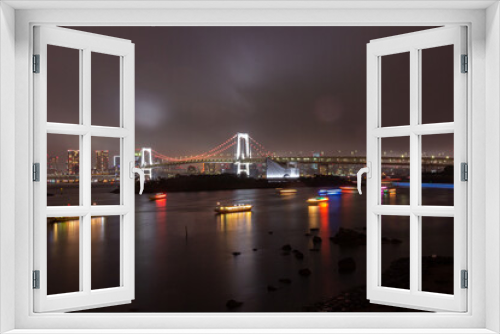 Fototapeta Naklejka Na Ścianę Okno 3D - Rainbow bridge at night in Daiba district in Tokyo (Japan)