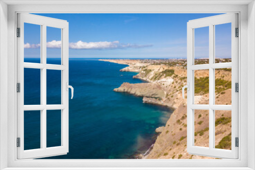 Fototapeta Naklejka Na Ścianę Okno 3D - Aerial view to beautiful sea coast with turquoise water and rocks in Fiolent Cape, Crimea.