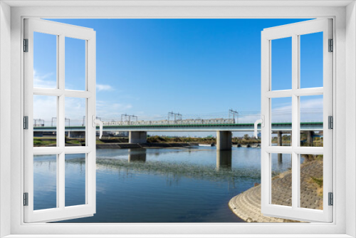 Fototapeta Naklejka Na Ścianę Okno 3D - 多摩川に架かる鉄橋の風景