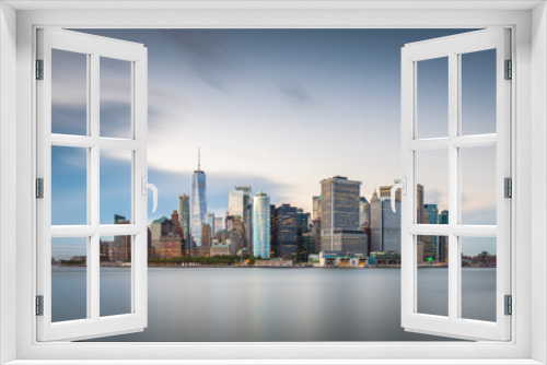 Fototapeta Naklejka Na Ścianę Okno 3D - New York, New York, USA skyline on the bay at twilight.