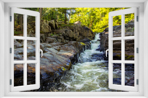 Fototapeta Naklejka Na Ścianę Okno 3D - Michigan Upper Peninsula Waterfall Landscape. Silver Falls is one of several waterfalls located in the forest of Baraga County, Michigan.