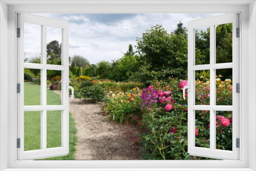Fototapeta Naklejka Na Ścianę Okno 3D - Botanischer Garten als Traumgarten, Staudengarten und märchenhaften Park mit vielen Blumen