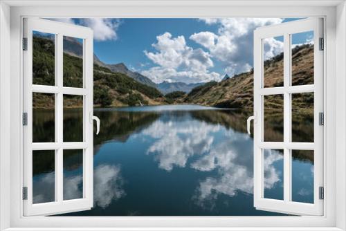 Fototapeta Naklejka Na Ścianę Okno 3D - Alpensee bei Sonnenschein im Sommer