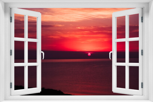 Fototapeta Naklejka Na Ścianę Okno 3D - sunset with views of the sea in the Crimea. Red sky and bright lillac sun. The landscape and the beautiful background