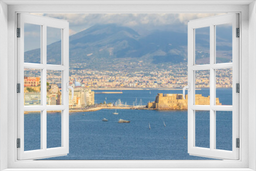 Fototapeta Naklejka Na Ścianę Okno 3D - Naples, Italy - built during the 15th century, Castel dell'Ovo (Egg Castle) is a seaside castle located in the Gulf of Naples. Here the fortress with Mount Vesuvius in the background