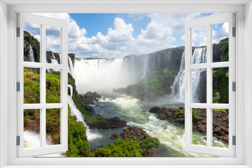 Fototapeta Naklejka Na Ścianę Okno 3D - Natural landscape of Cataratas do Iguaçu, also know as Iguazu Waterfalls in the border of Brazil and Argentina. Devil's Throat water fall visible with huge flow of water from Paraná River. 