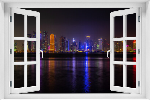 Fototapeta Naklejka Na Ścianę Okno 3D - Night panoramic view of Doha skyline.