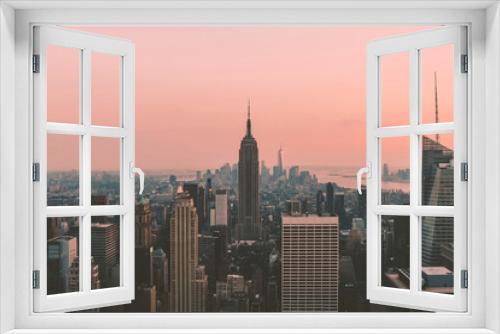 Fototapeta Naklejka Na Ścianę Okno 3D - Image of the Empire state building during sunset, NYC, United States of America.