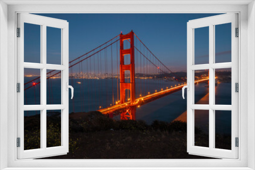 Fototapeta Naklejka Na Ścianę Okno 3D - Night image of the Golden Gate Bridge spanning across the San Francisco Bay