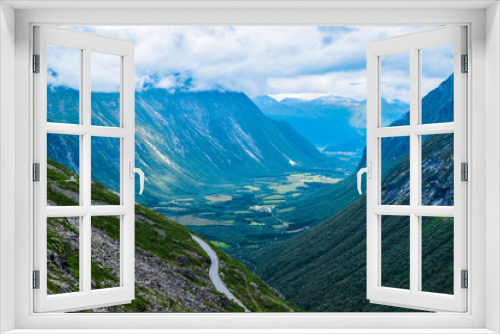 Fototapeta Naklejka Na Ścianę Okno 3D - Beautiful landscape of blue mountains from the Trollstigen or Troll Stairs viewpoint in Norway.