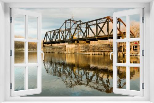 Fototapeta Naklejka Na Ścianę Okno 3D - Old Swinging Train Bridge