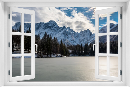 Fototapeta Naklejka Na Ścianę Okno 3D - Frozen lake of fusine in a sunny afternoon, Friuli-Venezia Giulia, Italy