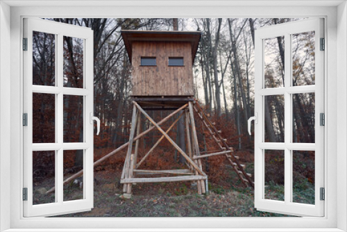 Fototapeta Naklejka Na Ścianę Okno 3D - New hunter house in the woods from the side.