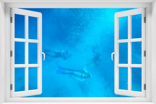 Fototapeta Naklejka Na Ścianę Okno 3D - Scuba diver in the blue sea