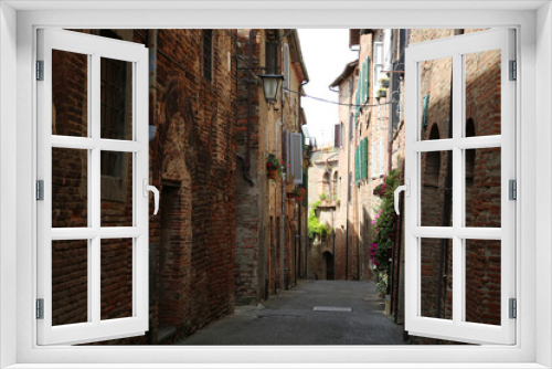 Fototapeta Naklejka Na Ścianę Okno 3D - Alley in the village of Citta della Pieve, Italy