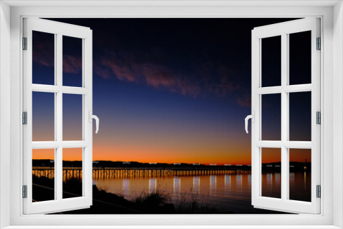 Fototapeta Naklejka Na Ścianę Okno 3D - Twinkling lights on pier and spectacular sunrise.  White Rock, BC