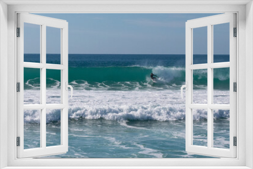 Fototapeta Naklejka Na Ścianę Okno 3D - Young surfer riding perfect surf wave at the beach of El Palmar. Spanish Atlantic coast in Cadiz, perfect surfing spot in Europe