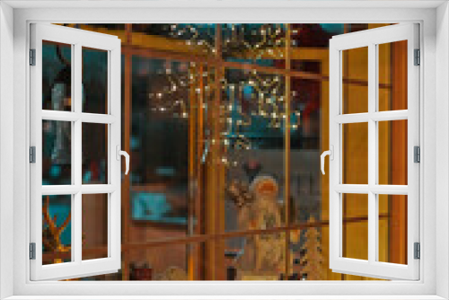 Fototapeta Naklejka Na Ścianę Okno 3D - Christmas Window Store Front On A Dark Street During At Night In Dover NH (New Hampshire)