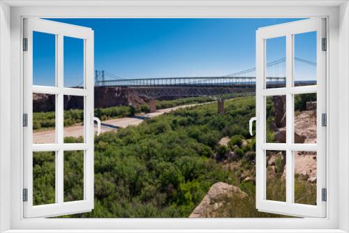 Fototapeta Naklejka Na Ścianę Okno 3D - bridge over river bed in the desert