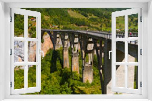 Fototapeta Naklejka Na Ścianę Okno 3D - Bridge Durdevica in River Tara canyon - Montenegro
