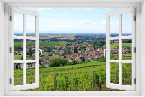 Fototapeta Naklejka Na Ścianę Okno 3D - View from the vineyards to Pleisweiler on the german wine route in the palatinate
