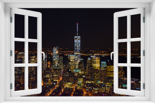 Fototapeta Naklejka Na Ścianę Okno 3D - Breathtaking Panoramic and Aerial View of  Manhattan, New York City at Night. Beautiful,  Illuminated, Futuristic Buildings. Freedom Tower, Lady Liberty Statue, Hudson River.