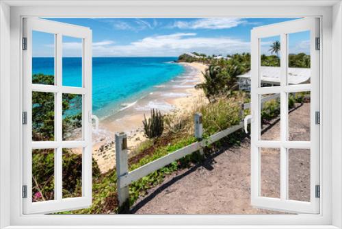 Fototapeta Naklejka Na Ścianę Okno 3D - Beautiful beach on Antigua Island, Caribbean. View from the street.
