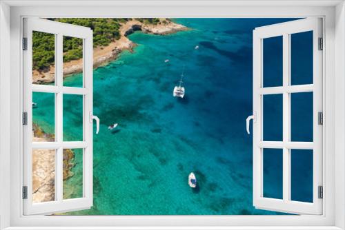 Fototapeta Naklejka Na Ścianę Okno 3D - Aerial drone ultra wide photo of exotic bay of Moni island visited by yachts and sail boats, Aegina island, Saronic gulf, Greece