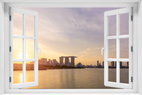 Fototapeta Naklejka Na Ścianę Okno 3D - Panoramic views of urban skyline and cityscape at sunset in Singapore.