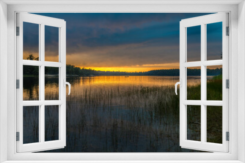 Fototapeta Naklejka Na Ścianę Okno 3D - Sunset above forest lake