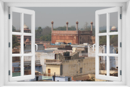 Fototapeta Naklejka Na Ścianę Okno 3D - Sirhi Darwaza, south gate of the Taj Mahal complex, and rooftops of Agra town. Agra. Uttar Pradesh. India.