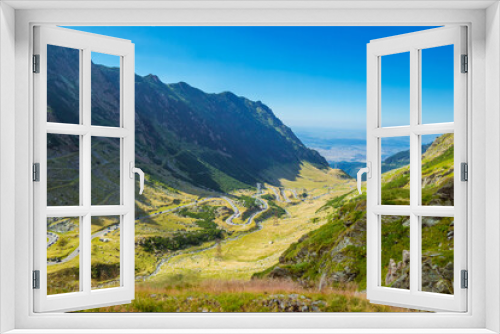 Fototapeta Naklejka Na Ścianę Okno 3D - Panoramic view of mountain road Transfagarasan, the most beautiful road in Europe, Romania Transfagarash Ridge Fagaras. Scenic view at canyon in Carpathian mountains, Transylvania. Sunday traffic jam