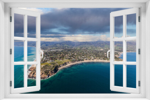 Aerial view of Point Dume and Westward Beach with stormy sky in scenic Malibu California.  