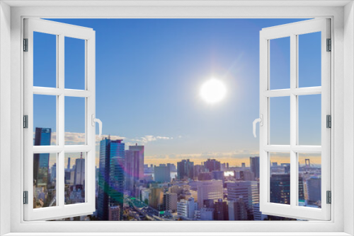 Fototapeta Naklejka Na Ścianę Okno 3D - 東京のビル群と朝日