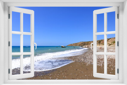 Fototapeta Naklejka Na Ścianę Okno 3D - Aphrodite Beach with Stone Rocks in Aphrodite bay of Mediterranean sea water, blue sky in sunny day background, Petra tu Romiou, Cyprus
