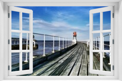 Fototapeta Naklejka Na Ścianę Okno 3D - The East pier at Whitby on the North Yorkshire Coast.