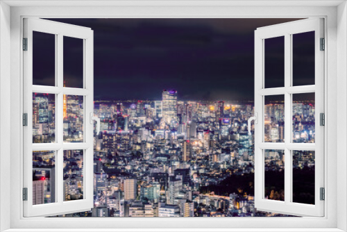 Fototapeta Naklejka Na Ścianę Okno 3D - 高層ビルが立ち並ぶ都会の夜景