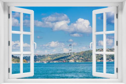 Fototapeta Naklejka Na Ścianę Okno 3D - Fatih Sultan Mehmet Bridge with background of Bosphorus strait cityscape on a sunny day with background cloudy blue sky and blue sea in Istanbul, Turkey. Blue Turkey concept.